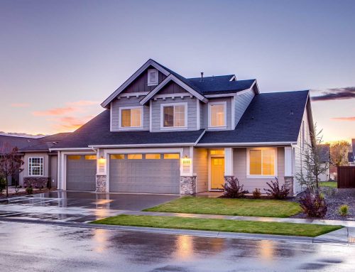 How Asphalt Driveways and Roof Drainage Work Together to Prevent Foundation Damage