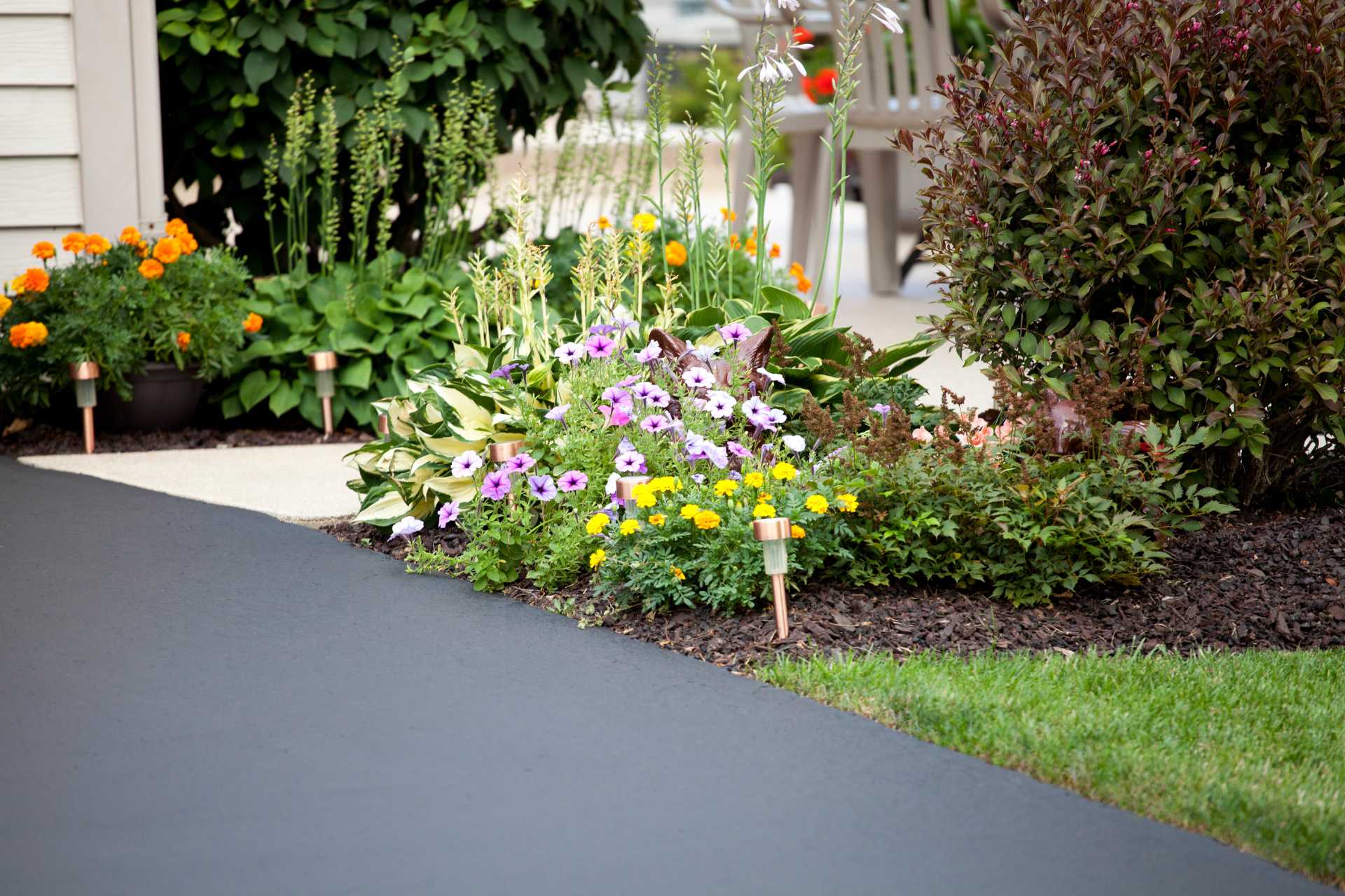 Transform Your Home’s First Impression with a Clean, Smooth Asphalt Driveway - C-T Paving Ltd
